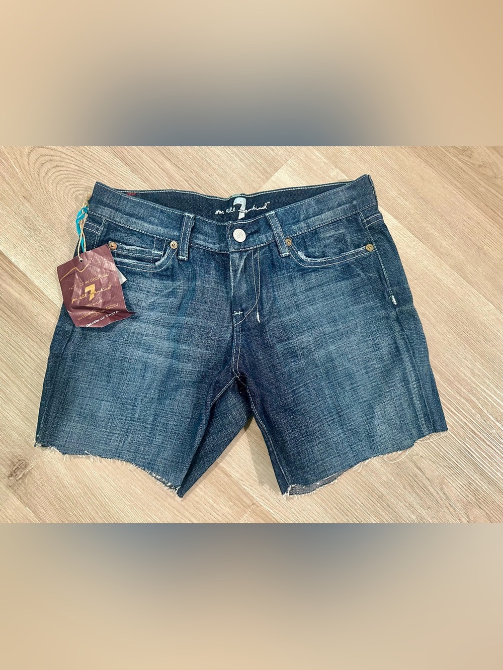 7 For All Mankind Blue Denim Cutoff Shorts with Frayed Hem